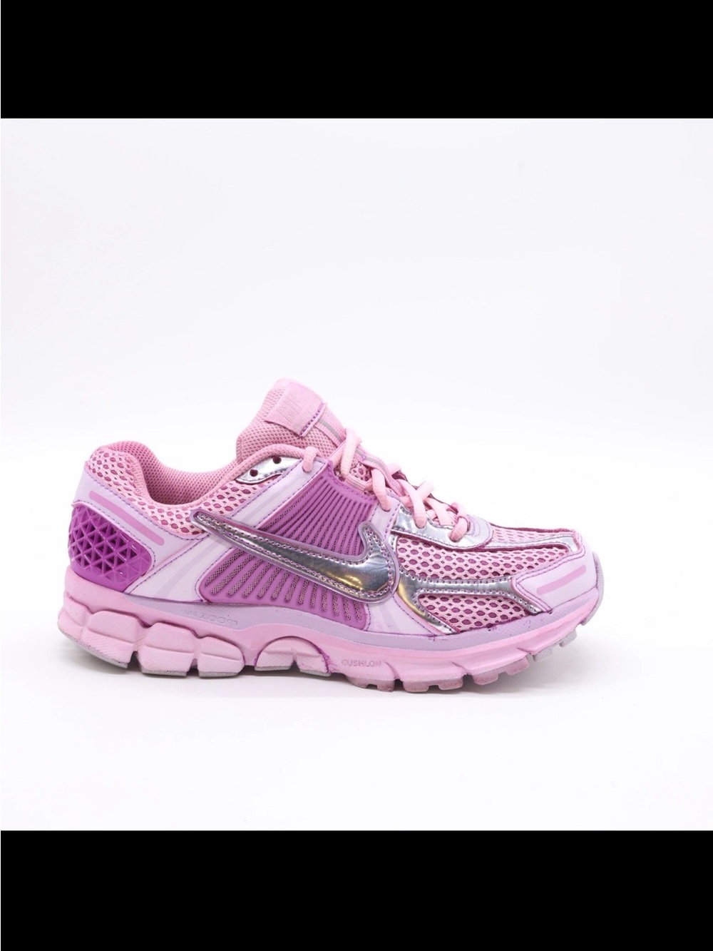 Nike Pink Women's Running Sneaker with Metallic Silver Swoosh